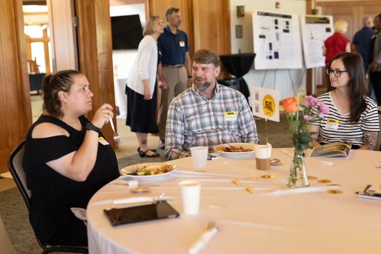 Katie Weihbrecht, Eric Van Otterloo and Nicole Recka talking over lunch