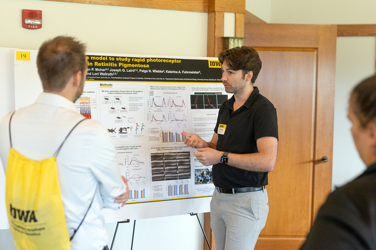 Tyler Rankin presenting his poster