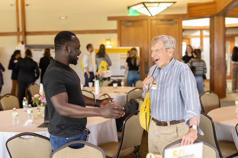 Retreat attendees talking excitedly