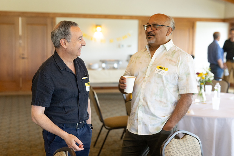 Retreat attendees talking over coffee