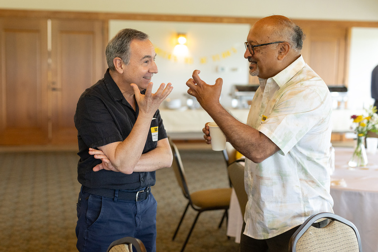 Retreat attendees talking over coffee