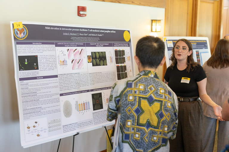 Jordan Mayberry presenting her poster