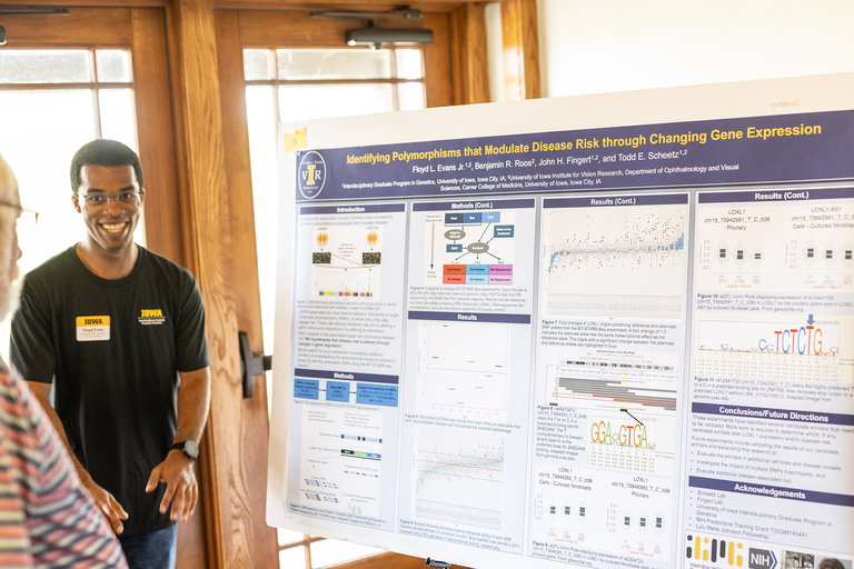 Floyd Evans presenting his poster